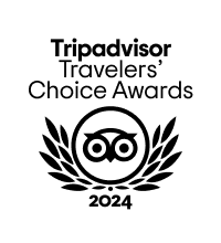 The image shows the Tripadvisor Travelers' Choice Awards 2024 logo featuring an owl surrounded by laurel leaves.